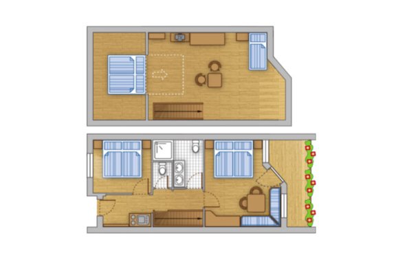 Der Grundriss zeigt eine Ferienwohnung mit zwei Schlafzimmern, einem Bad und einem Wohnbereich mit Küche.